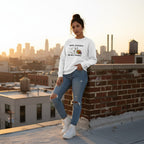 Latina woman wearing a white His Fight Is My Fight autism awareness sweatshirt.