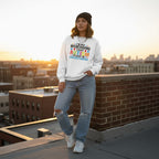Latina woman wearing a white im not misbehaving i have autism sweatshirt.