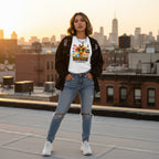 Latina woman wearing a white It's OK to Be Different giraffe t-shirt in a streetwear style.