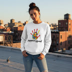 Latina woman wearing a white support squad autism awareness sweatshirt.