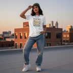 Latina woman wearing a white neurodiversity awareness t-shirt in a streetwear style.