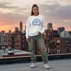Latina woman wearing a white autism awareness sweatshirt.