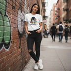Latina woman wearing a white autism mom t-shirt.