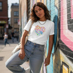 Latina woman wearing a white celebrate minds t-shirt.