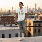Latino man wearing a white God Says I Am autism awareness t-shirt.