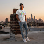 Latino man wearing a white autism awareness T-shirt in a streetwear style.