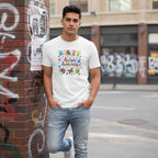 Latino man wearing a white autism awareness t-shirt.