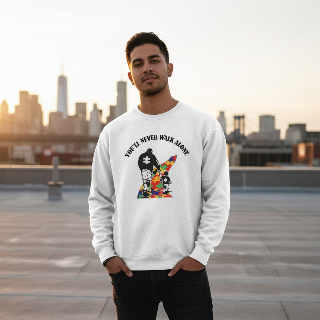 Latino man wearing a white autism awareness sweatshirt.