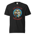 Front view of a black T-shirt featuring two cartoon chickens in a blue emblem, with “LOS POLLOS HERMANOS” lettering.