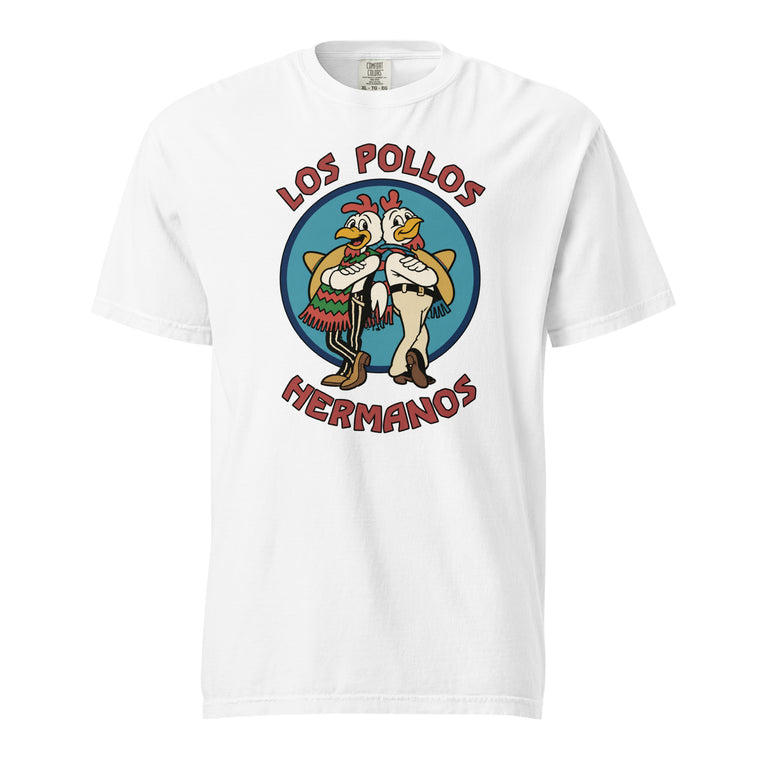 White T-shirt with two cartoon chickens in a blue emblem, one in a colourful shawl and one in western clothing, with Los Pollos Hermanos text