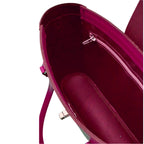 Close-up of a pink handbag with a zipper on a white background