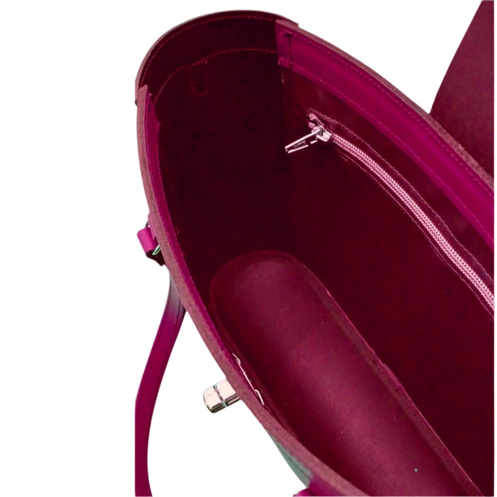 Close-up of a pink handbag with a zipper on a white background