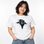 Front view of a person wearing a White T-shirt with a central black melting ghost skull graphic, hollow eyes and dripping edges.