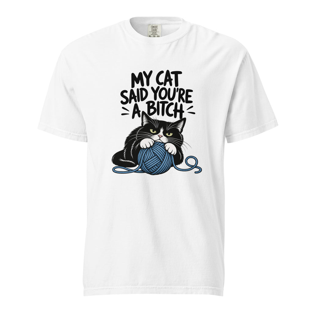 White T-shirt with bold text above a black-and-white cat clutching a blue yarn ball with loose strands around it.
