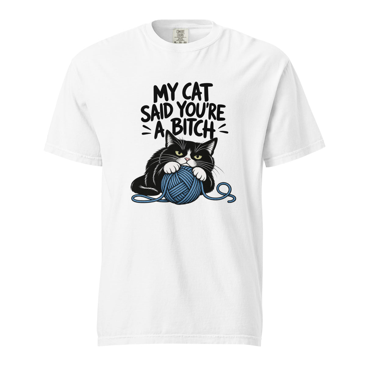 White T-shirt with bold text above a black-and-white cat clutching a blue yarn ball with loose strands around it.