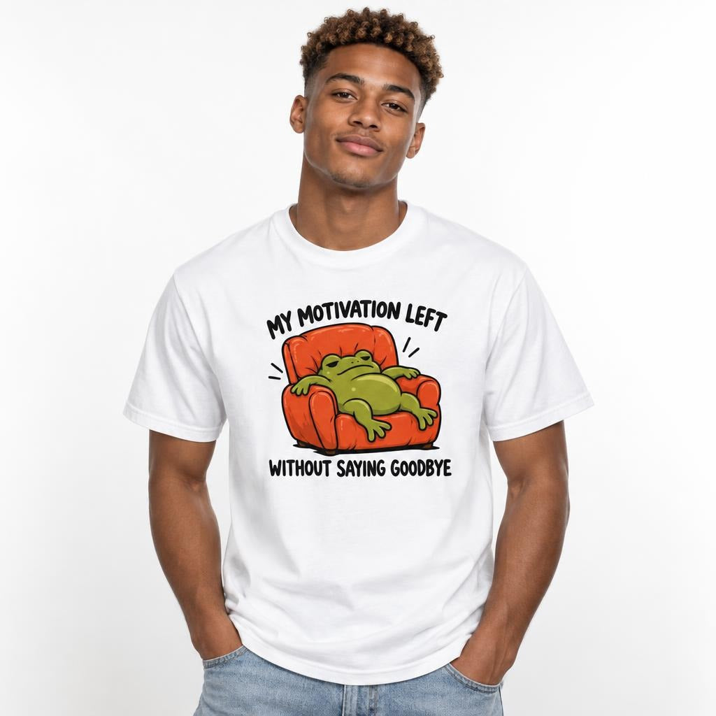 Model wearing a white T-shirt with a green frog slumped in an orange armchair and the text “MY MOTIVATION LEFT.”