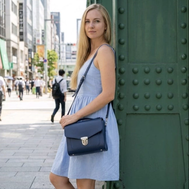 Zatchels Navy Sugarcube handbag model view