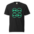 Front view of a black T-shirt with four outlined neon-green emoji faces in a two-by-two grid, showing varied expressions.