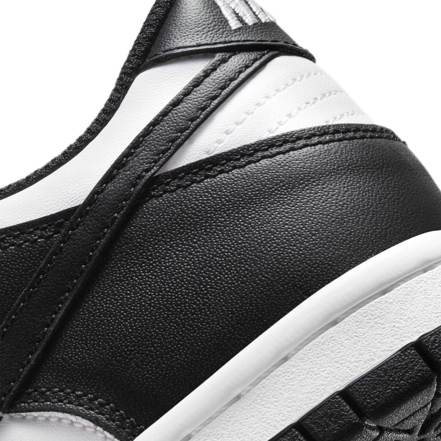 Nike Dunk Low GS Black White trainers extra product angle