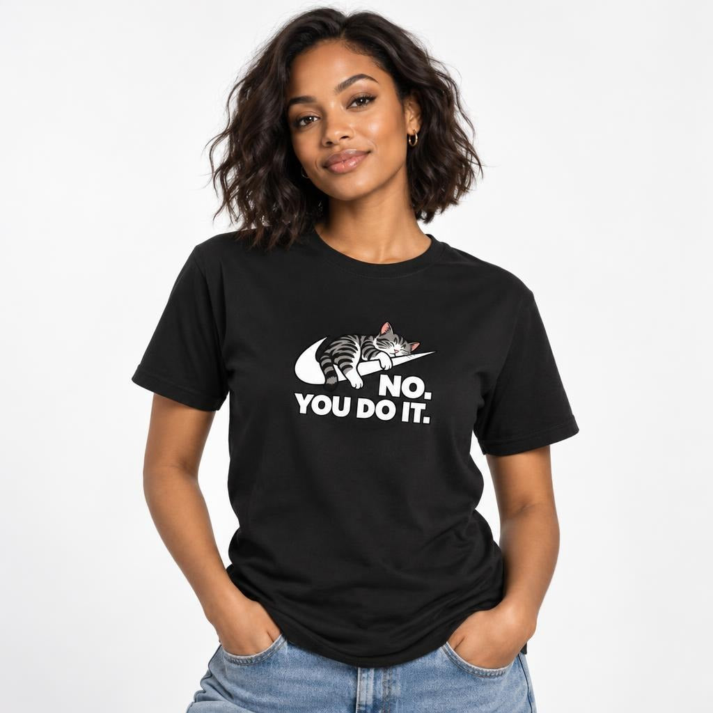 Model wearing a Black T-Shirt with a sleeping grey tabby cat draped over a white swoosh-shaped motif above “NO. YOU DO IT.”