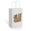 White paper gift bag featuring a vintage Halloween illustration of a jack-o-lantern, black cat, and witch child.