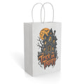 Front view of a paper gift bag featuring a spooky haunted house, bats, a moon, and orange Trick or Treat lettering.
