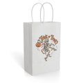 White paper gift bag featuring an orange-and-gray skeleton holding a pumpkin with “Trick or Treat” text.