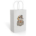 White paper gift bag with twisted handles, showing a ghost in a witch hat holding a pumpkin treat bucket beneath a “Trick or Treat?” banner.