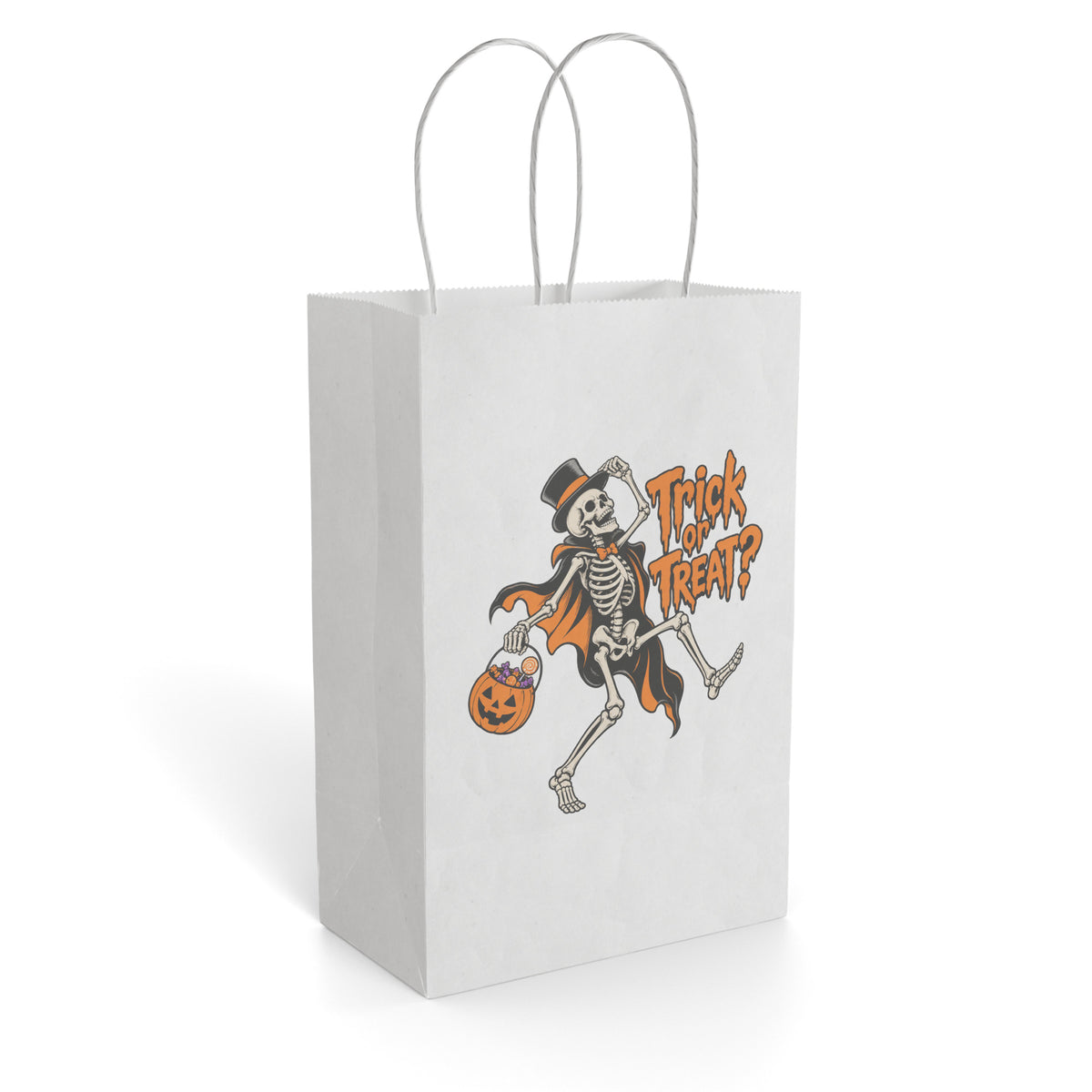White paper gift bag with twisted handles, showing a top-hatted dancing skeleton in an orange cape holding a pumpkin treat bucket beside “Trick or Treat?” text
