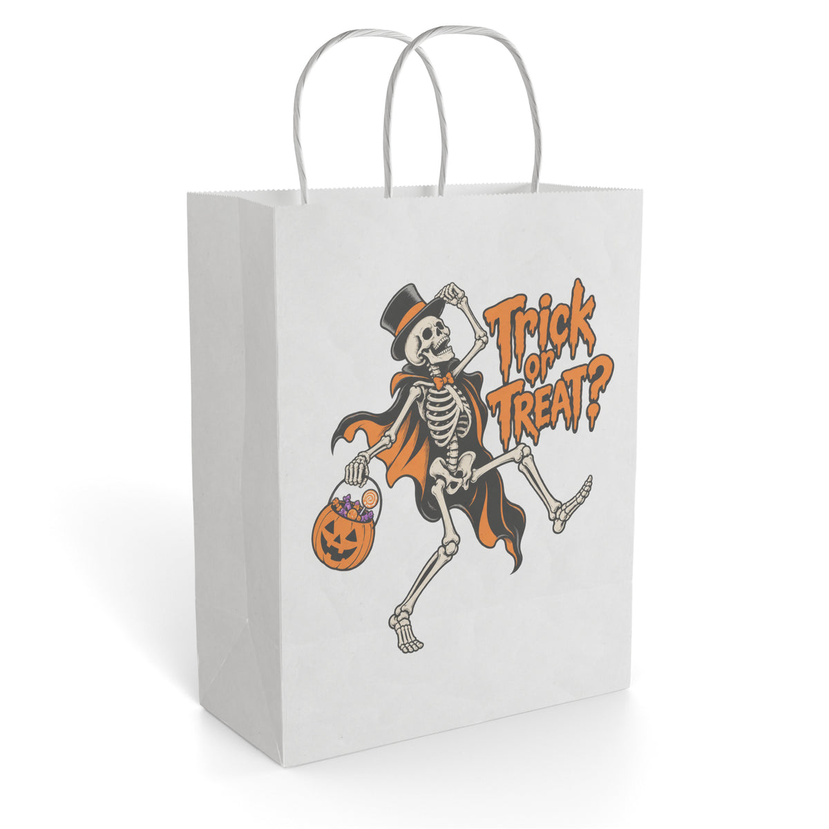 White paper gift bag with twisted handles, a top-hatted dancing skeleton, pumpkin treat bucket and bold orange “Trick or Treat?” lettering
