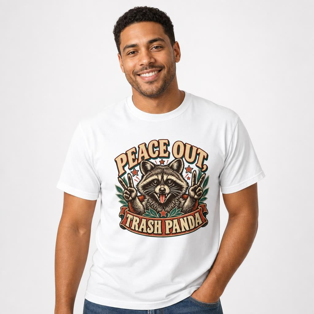 Front view of a person wearing a white T-shirt featuring a cheerful raccoon graphic with “Peace Out Trash Panda” text.
