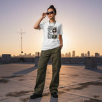 East Asian woman in streetwear wearing a white t-shirt with a skeleton girl design.