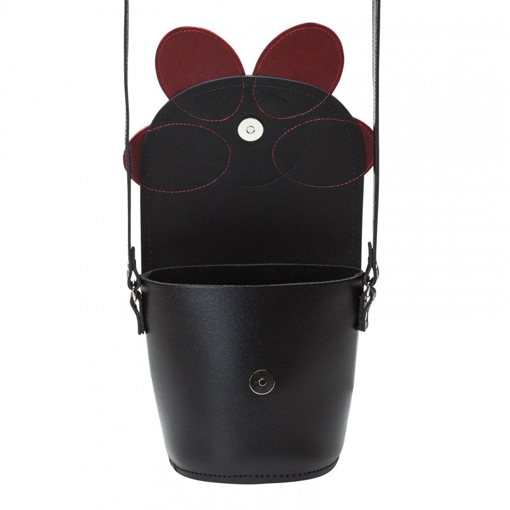 Black bucket bag with red accents on a white background