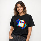 Model wearing a black T-shirt featuring a central stylized white ghost with rainbow outlines and colorful motion-like brush strokes.