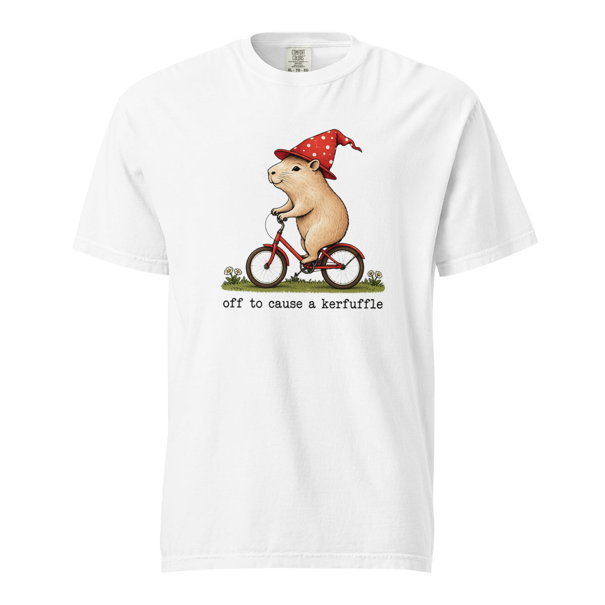 Front view of a white T-shirt with a rat in a red polka-dot hat riding a red bicycle above the words “off to cause a kerfuffle.”