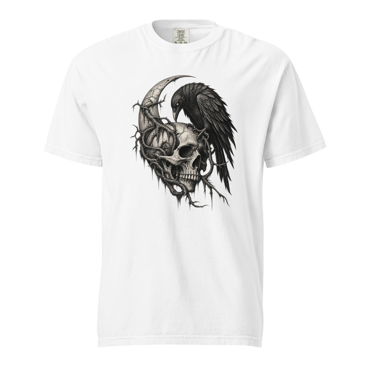 Front view of a white T-shirt featuring a detailed gothic raven beside a skull, crescent moon, pumpkin-like form, and tangled botanicals.