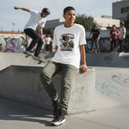 Skate park streetwear shot featuring a person in urban apparel at an outdoor skate park.