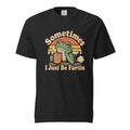 Front view of a black T-shirt with “Sometimes I Just Be Fartin,” featuring a frog holding a steaming coffee cup before a striped sunset.
