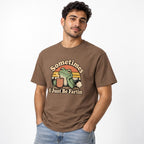 Front view of an Espresso T-shirt on a model, featuring a green frog holding a steaming coffee cup and the words “Sometimes I Just Be Fartin.”