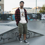 South Asian man wearing a white t-shirt in a streetwear setting