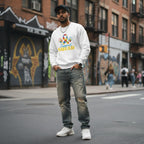 South Asian man wearing a white autism awareness support squad sweatshirt.