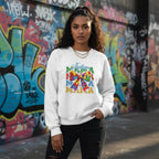 South Asian woman wearing a white autism mama sweatshirt.