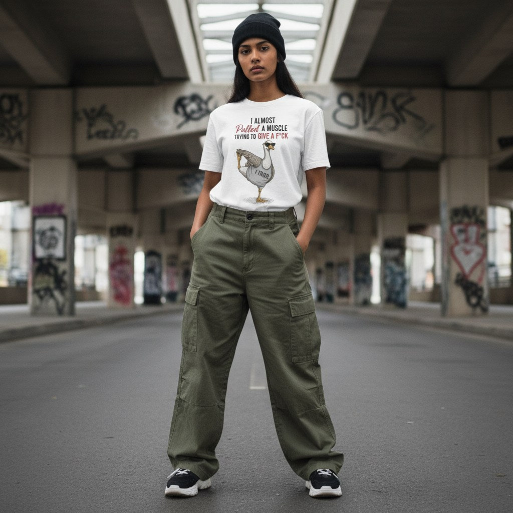 South Asian woman wearing a white streetwear t-shirt outdoors