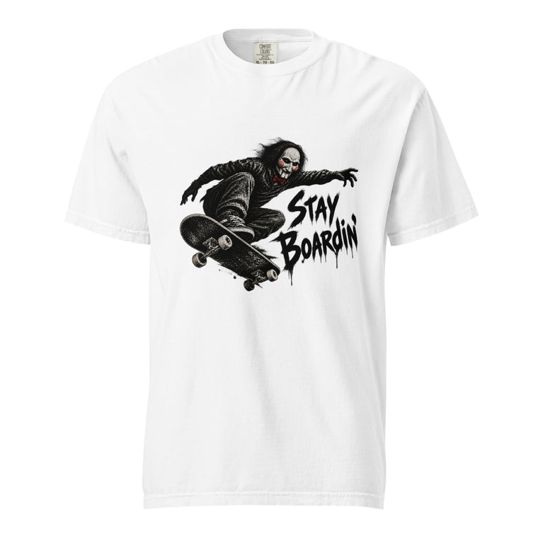 White T-shirt with a central black-and-red illustration of a masked skateboarder doing a trick, beside distressed “STAY BOARDIN’” lettering.