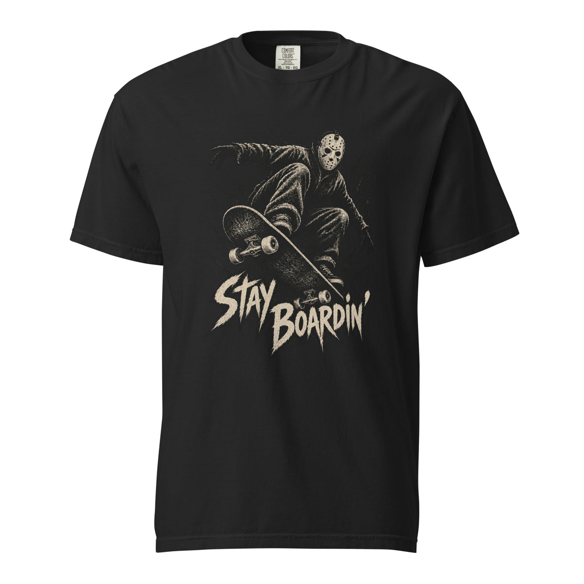 Front view of a black T-shirt featuring a masked skater crouching on a skateboard above distressed cream “STAY BOARDIN’” lettering.