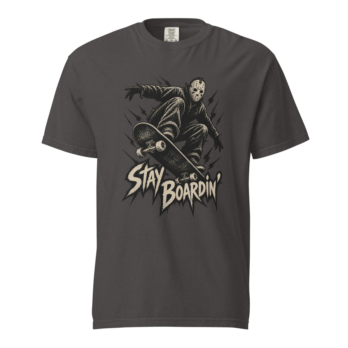 Graphite T-shirt with a front graphic of a masked skater crouching on a skateboard above distressed cream “STAY BOARDIN’” lettering.