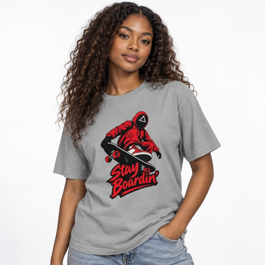 Model wearing a Granite T-shirt with a crouching masked skateboarder on a black skateboard and red Stay Boardin' lettering.