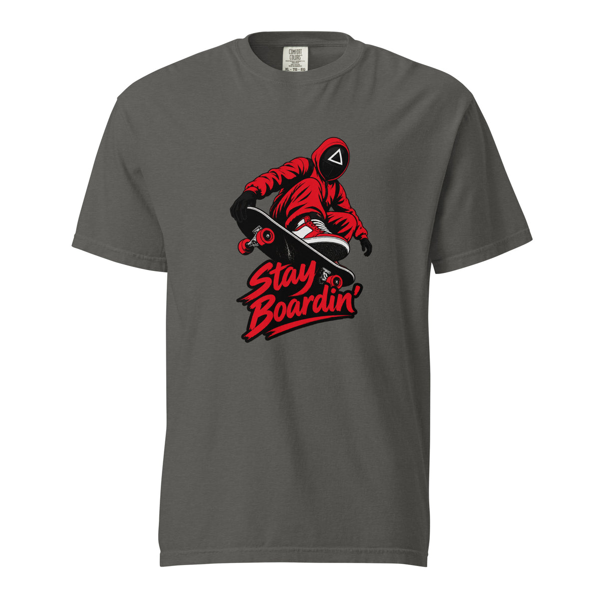Front view of a Pepper T-shirt with a masked skateboarder riding a skateboard above bold red “Stay Boardin’” lettering.