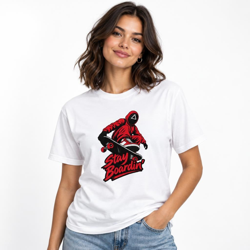 White T-shirt with a graphic of a masked skateboarder riding a skateboard above bold red “Stay Boardin'” lettering.