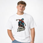 Front view of a white T-shirt with a skeleton in a backwards cap riding a skateboard above “Stay Boardin'” lettering.